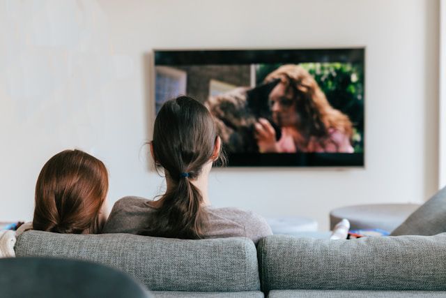 Family watching streaming tv