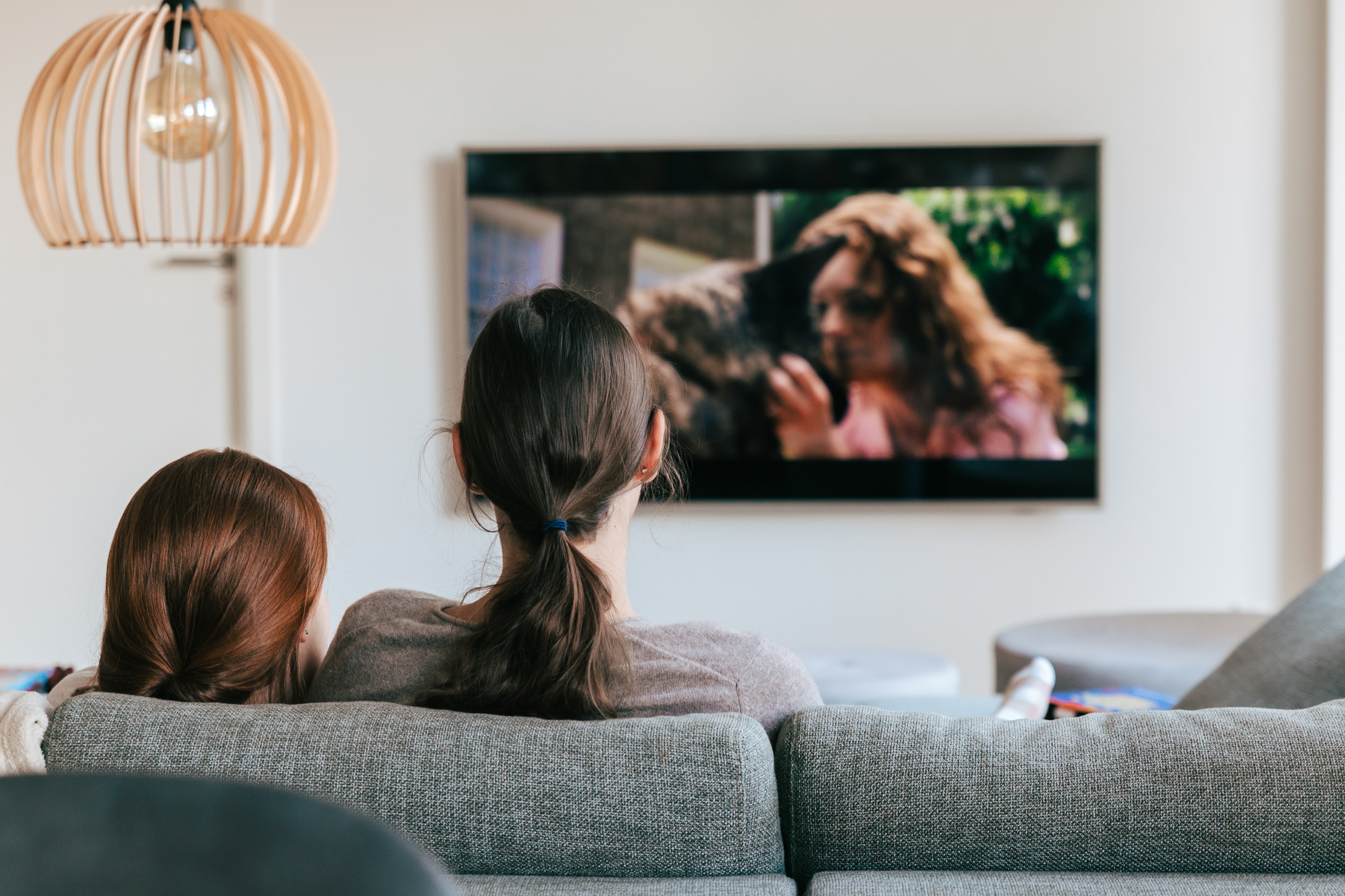 Family watching streaming tv